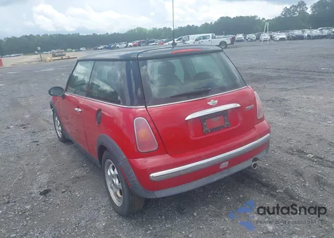 2004 Mini Cooper z USA, uszkodzony, nr VIN WMWRC33404TJ58399